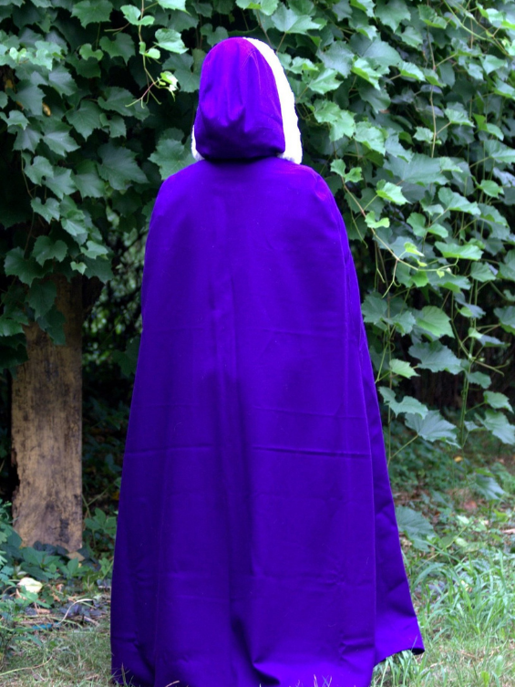 Purple hooded cape with white fur