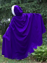 Purple hooded cape with white fur