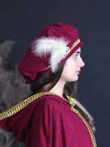 Burgundy beret with ivory feathers