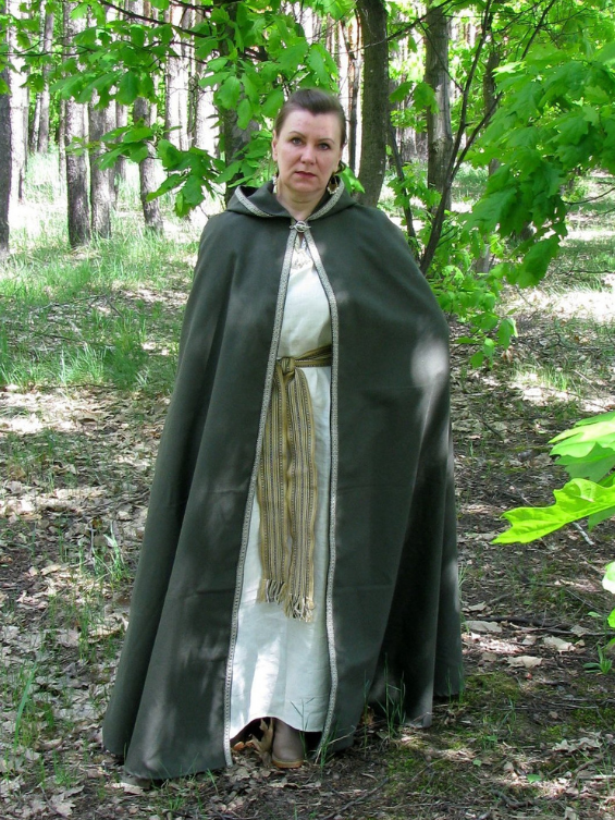 Green hooded cloak with braided trim