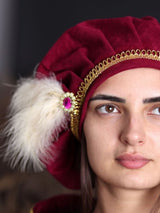 Burgundy beret with ivory feathers