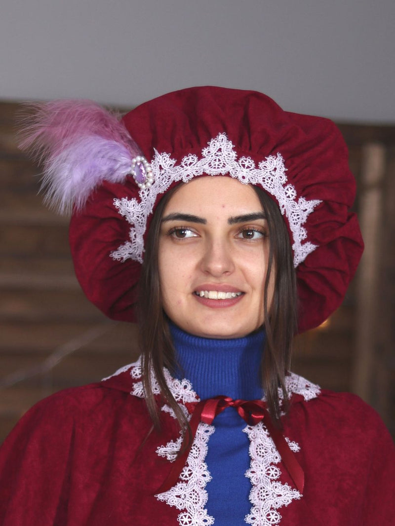 Burgundy beret with pink feathers