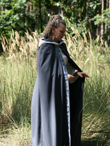 Gray wool hooded cape with white fur